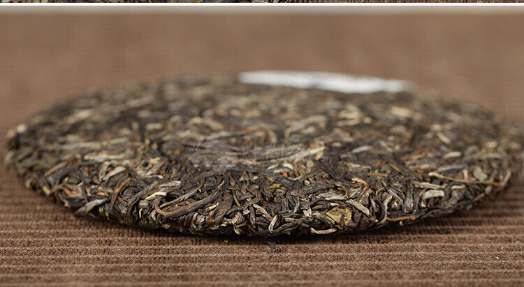 HelloYoung Xiaguan Qian Jia Zhai Wild Aged Old Tree Round Cake Puer Raw Pu'er Tea 357g