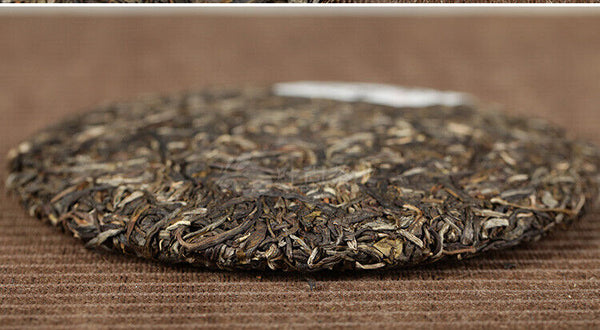 HelloYoung Xiaguan Qian Jia Zhai Wild Aged Old Tree Round Cake Puer Raw Pu'er Tea 357g