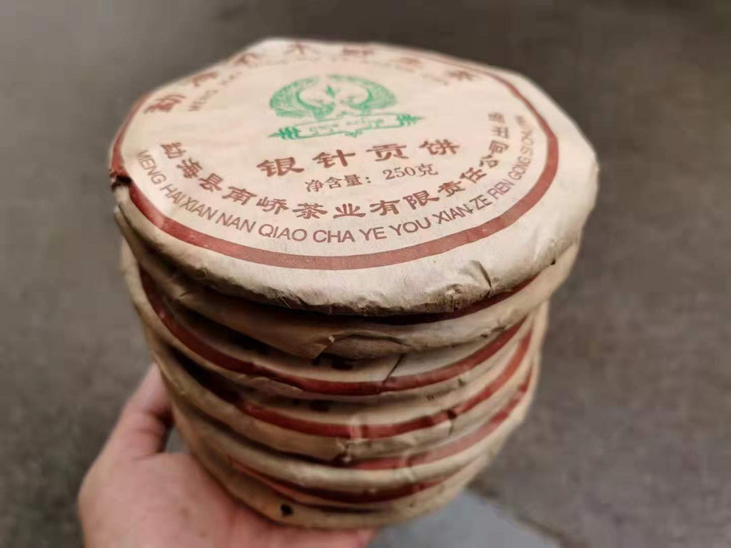 2006 Nanqiao Menghai Arbor Wild Tea Silver Needle Tribute Cake Raw Pu'er 250g