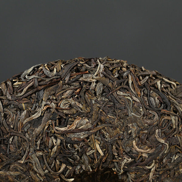 Xiaguan Qian Jia Zhai Wild Aged Old Tree Round Cake Puer Raw Pu'er Tea 357g