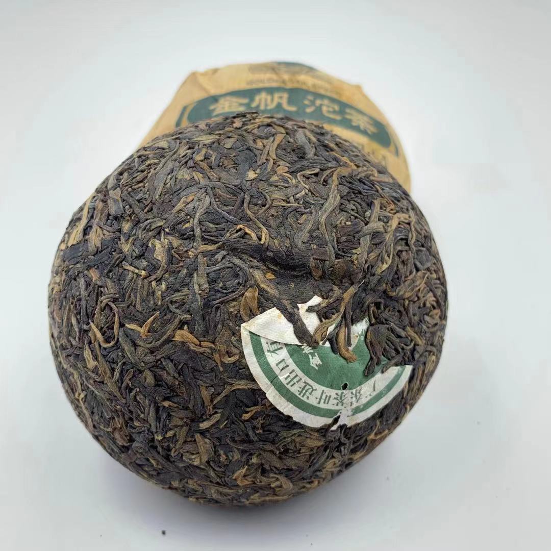 GOLDEN SAIL Pu-erh Tuo Cha 7332 Ancient Tree Pu'er Aged Puer Tea Raw 250g Main image
